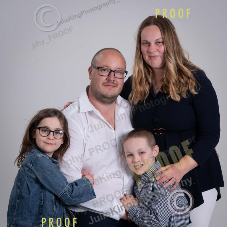 Relaxed and natural family photography session in a Bromsgrove studio, capturing ​t​he moment.